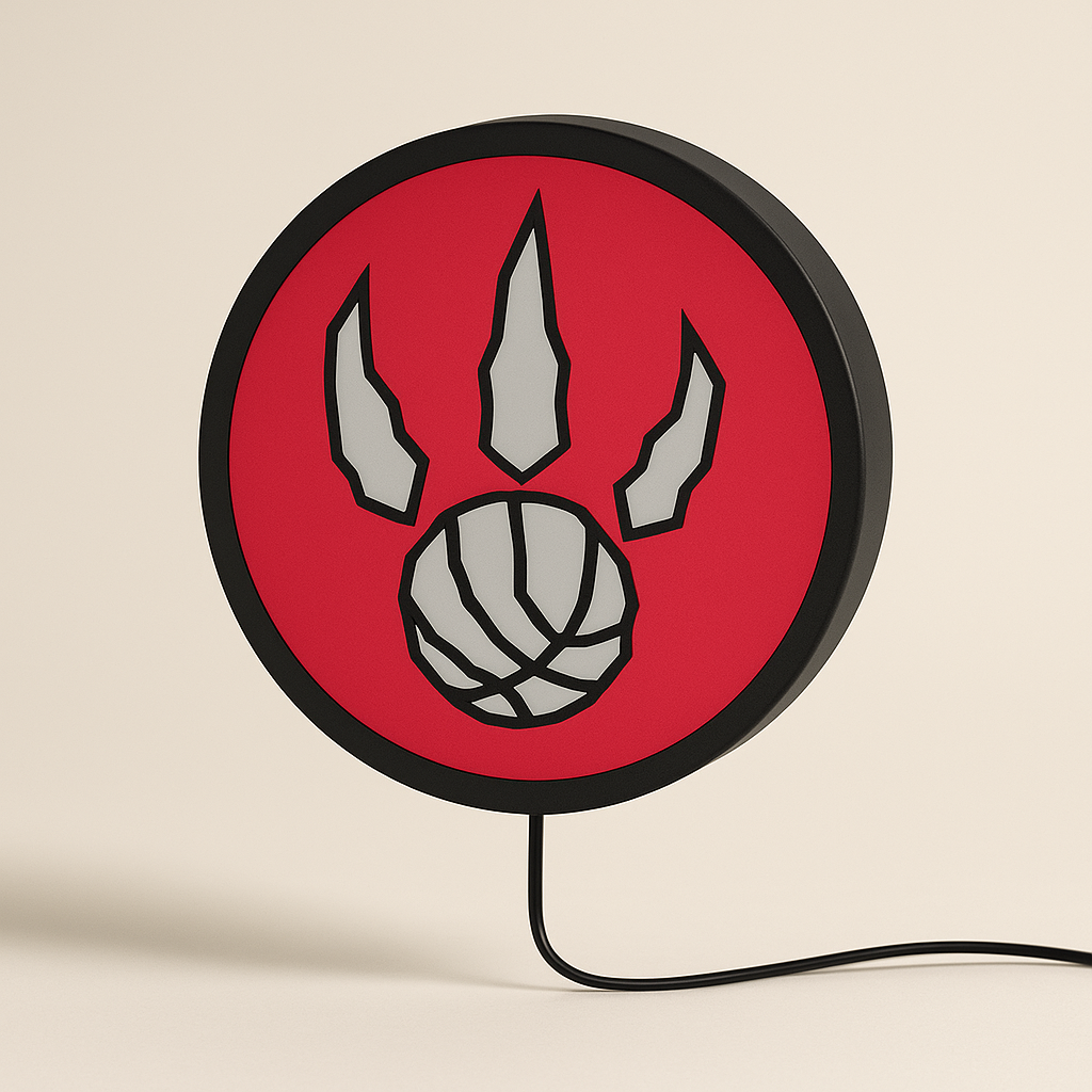 Toronto Raptors Round Claw Logo LED Sign shown in daylight