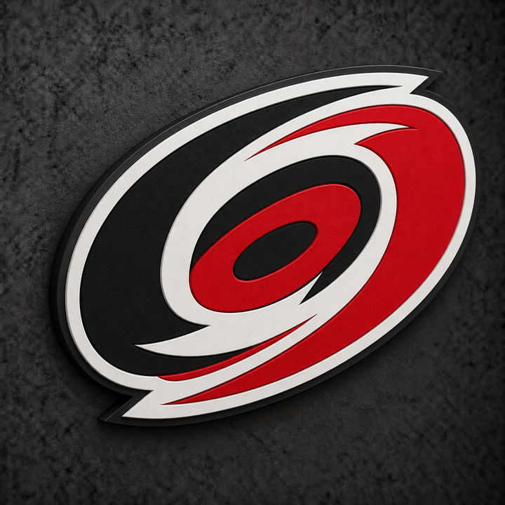 Carolina Hurricanes 3D Plaque with raised layered artwork on a dark charcoal wall