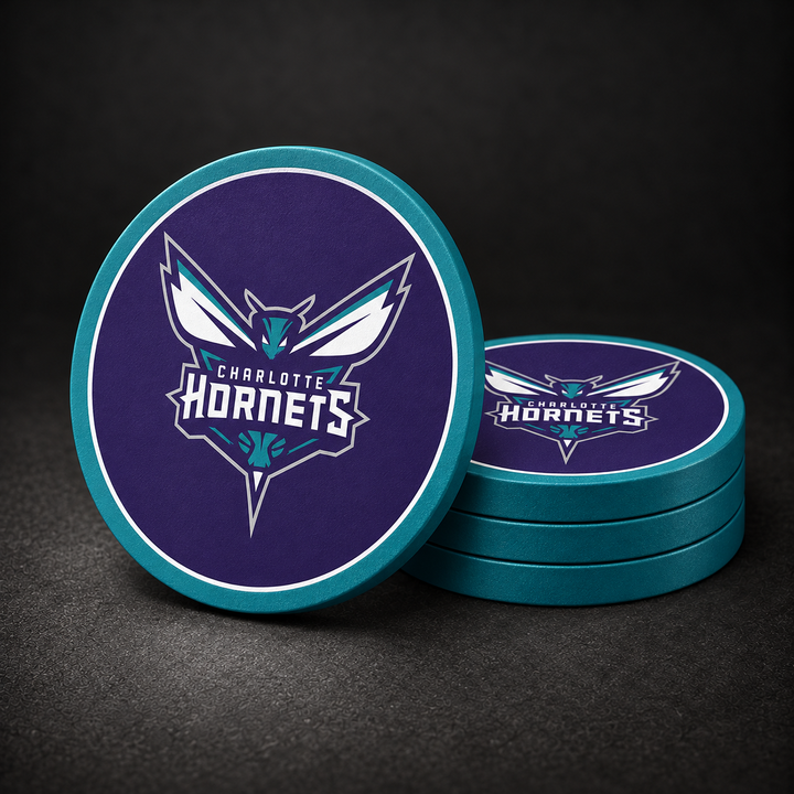 Charlotte Hornets Drink Coasters with teal sides, three stacked and one standing on a dark charcoal background