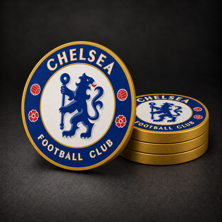 Chelsea Drink Coasters with gold sides, three stacked and one standing on a dark charcoal background