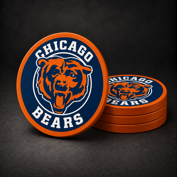 Chicago Bears Drink Coasters with orange sides, three stacked and one standing on a dark charcoal background