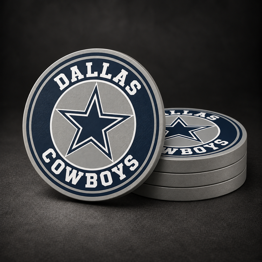 Dallas Cowboys Drink Coasters with grey sides, three stacked and one standing on a dark charcoal background