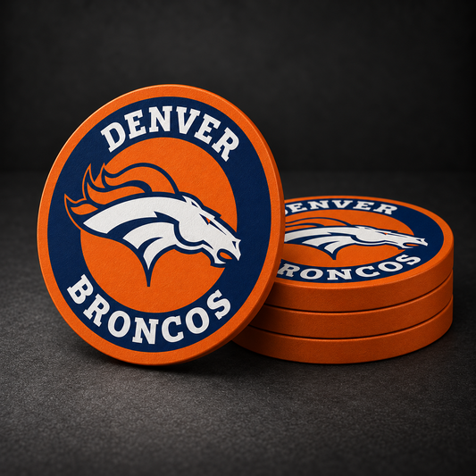 Denver Broncos Drink Coasters with orange sides, three stacked and one standing on a dark charcoal background
