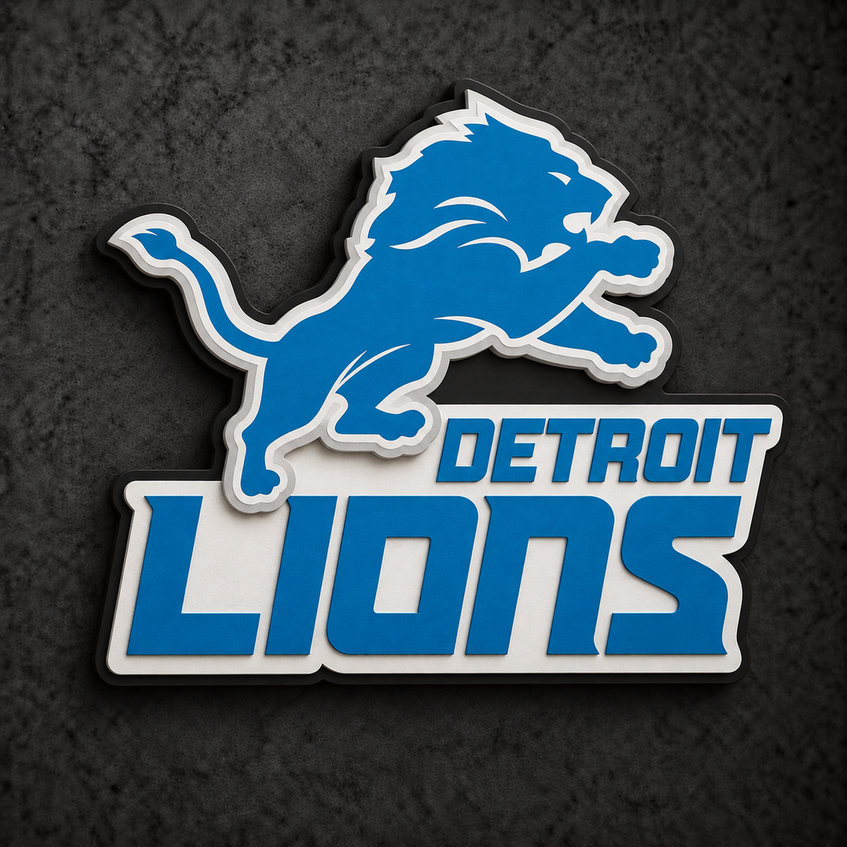 Detroit Lions 3D Plaque with raised layered artwork on a dark charcoal wall