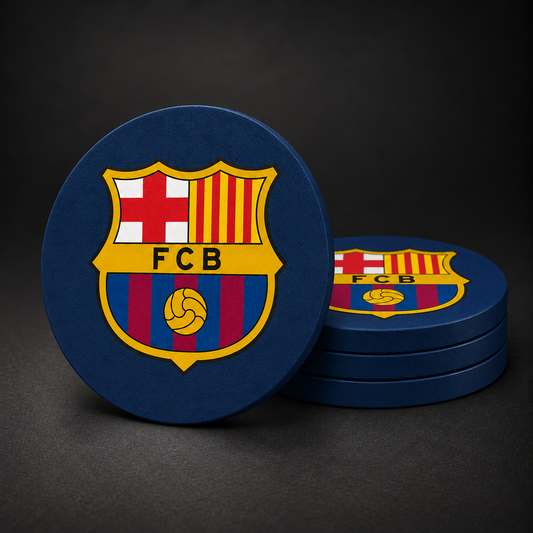 FC Barcelona Drink Coasters with navy blue sides, three stacked and one standing on a dark charcoal background