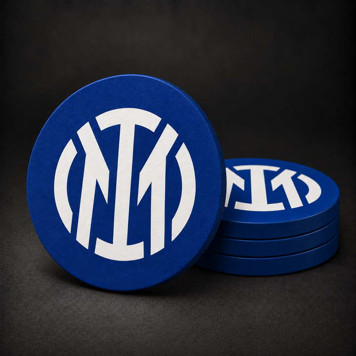 Inter Milan Drink Coasters with royal blue sides, three stacked and one standing on a dark charcoal background