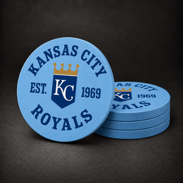 Kansas City Royals Drink Coasters with light blue sides, three stacked and one standing on a dark charcoal background