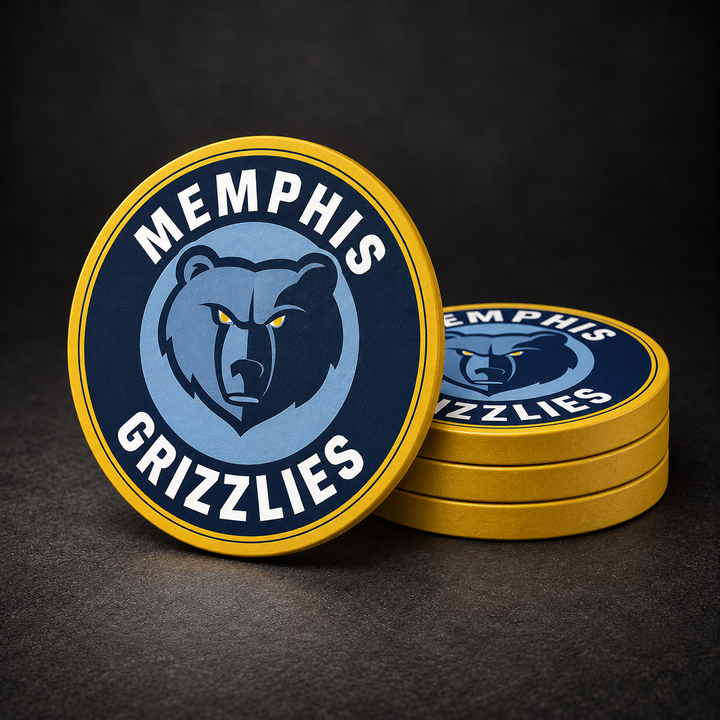 Memphis Grizzlies Drink Coasters with gold sides, three stacked and one standing on a dark charcoal background