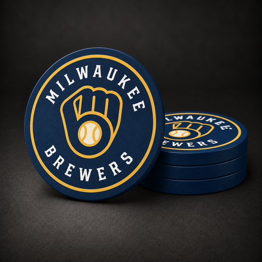Milwaukee Brewers Drink Coasters with navy blue sides, three stacked and one standing on a dark charcoal background