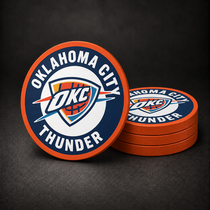 Oklahoma City Thunder Drink Coasters with orange sides, three stacked and one standing on a dark charcoal background