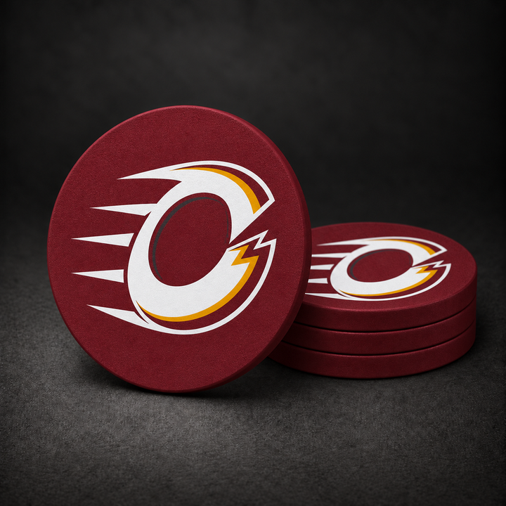 Ottawa Charge Drink Coasters with burgundy red sides, three stacked and one standing on a dark charcoal background