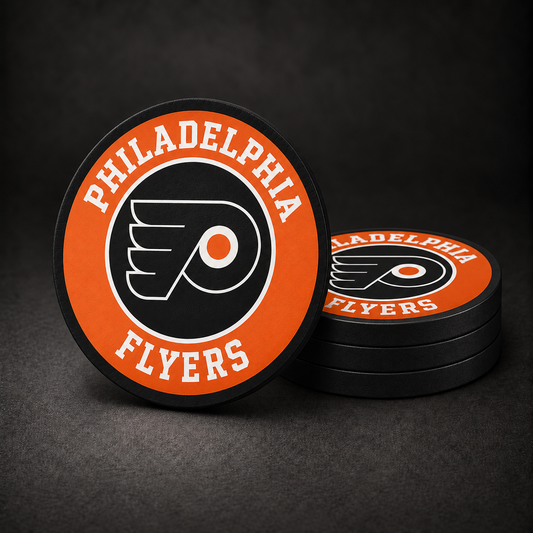 Philadelphia Flyers Drink Coasters with black sides, three stacked and one standing on a dark charcoal background