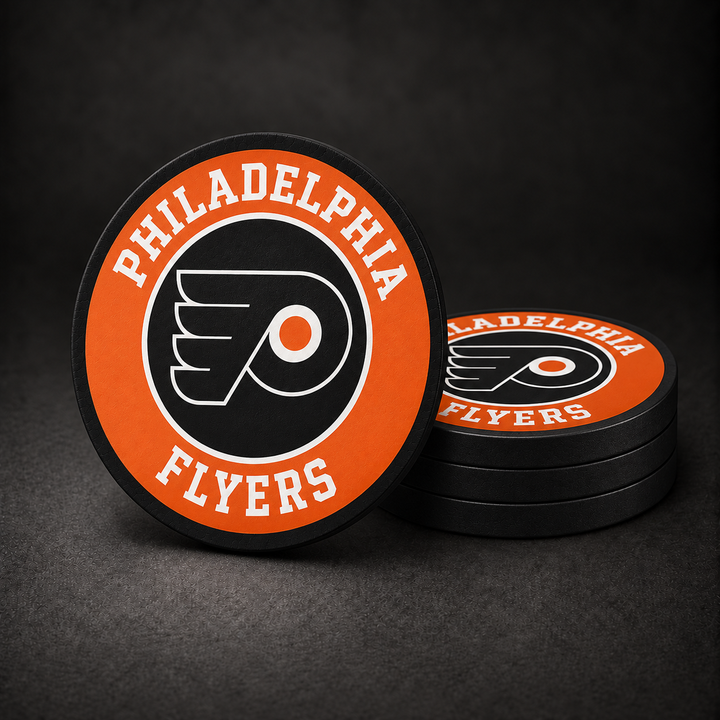 Philadelphia Flyers Drink Coasters with black sides, three stacked and one standing on a dark charcoal background