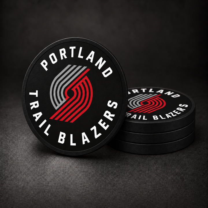 Portland Trail Blazers Drink Coasters with black sides, three stacked and one standing on a dark charcoal background