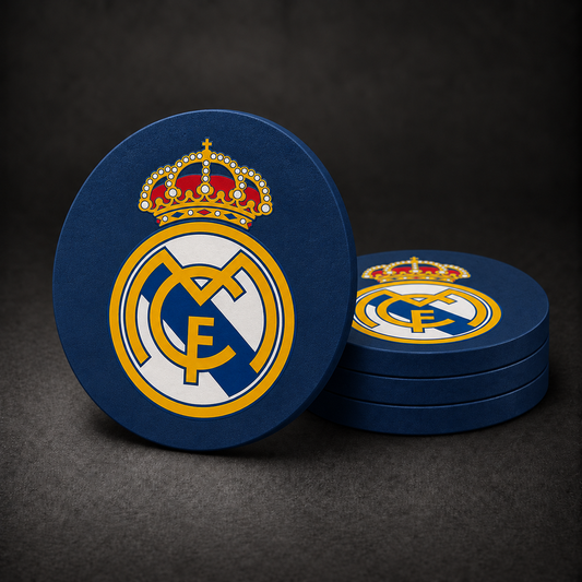 Real Madrid Drink Coasters with navy blue sides, three stacked and one standing on a dark charcoal background