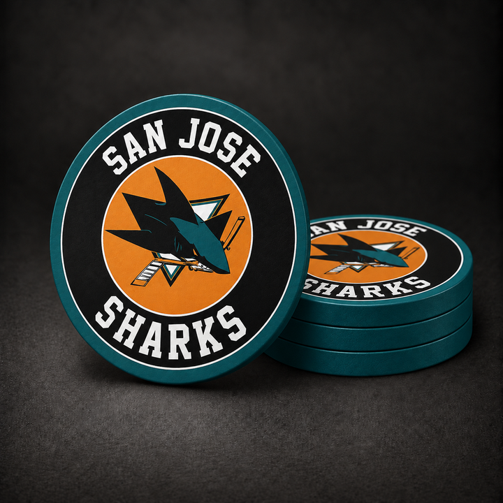 San Jose Sharks Drink Coasters with teal sides, three stacked and one standing on a dark charcoal background
