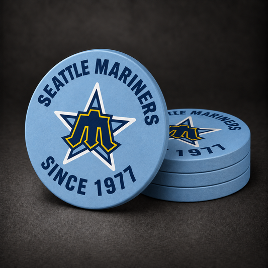 Seattle Mariners Drink Coasters with light blue sides, three stacked and one standing on a dark charcoal background